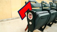 A number seven sign is placed on a seat for former Minnesota Twins player Joe Mauer's number retirement ceremony before a game between the Kansas City Royals and the Minnesota Twins at Target Field.