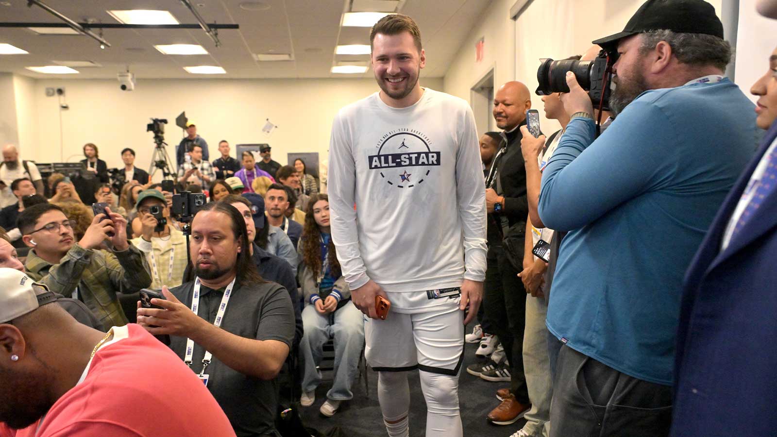 Feb 14, 2026; Los Angeles, CA, USA; Team World guard Luka Doncic (77) of the Los Angeles Lakers arrives for a news conference for the NBA All Star game at Intuit Dome. Mandatory Credit: Jayne Kamin-Oncea-Imagn Images
