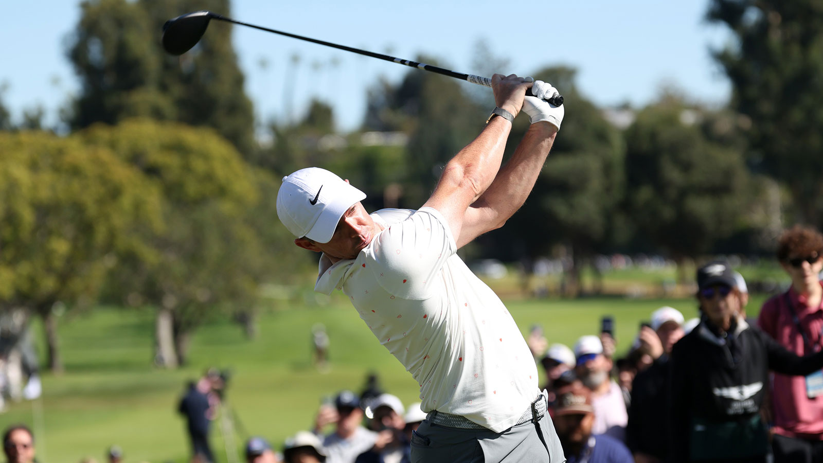 Rory McIlroy hits his tee shot on the third hole during the third round of the The Genesis Invitational golf tournament at Riviera Country Club.