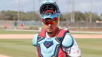 St. Louis Cardinals catcher Yohel Pozo (63) walks on the field during spring training workouts at Roger Dean Stadium.