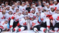 Team Canada players pose for a team photo after defeating Team Europe in game two of the World Cup of Hockey final at Air Canada Centre.