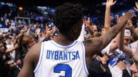 BYU Cougars forward AJ Dybantsa (3) celebrates with fans after a win over the Texas Tech Red Raiders at Marriott Center.