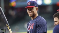 United States right fielder Aaron Judge (99) smiles during batting practice before the game against Brazil at Daikin Park.