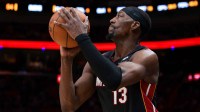 Miami Heat center Bam Adebayo (13) shoots the basketball against the Milwaukee Bucks during the third quarter at Kaseya Center.