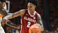 Alabama Crimson Tide guard Aden Holloway (2) moves the ball against the Tennessee Volunteers during the second half at Thompson-Boling Arena at Food City Center.
