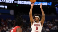 Alabama Crimson Tide forward Amari Allen (5) shoots past Texas Tech Red Raiders forward Luke Bamgboye (9) in the first half during a second round game of the men's 2026 NCAA Tournament at Benchmark International Arena.