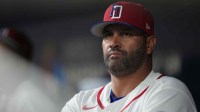 Dominican Republic manager Albert Pujols (5) looks out at the field before the game against Nicaragua at loanDepot Park.