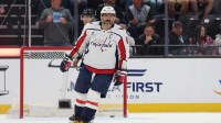 Washington Capitals left wing Alex Ovechkin (8) scores an open net goal to complete a hat trick (three goals) during the third period of a game against the Utah Mammoth at Delta Center.