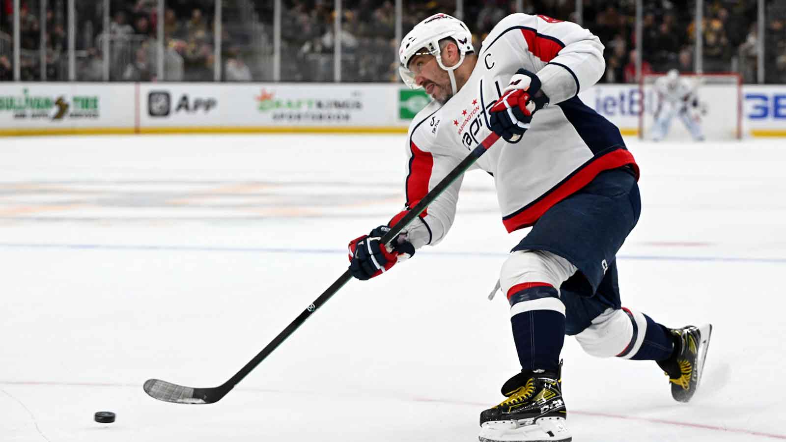 Washington Capitals left wing Alex Ovechkin (8) attempts a shot against the Boston Bruins during the second period at the TD Garden.