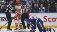 Anaheim Ducks defenseman Radko Gudas (7) looks at an injured Toronto Maple Leafs forward Auston Matthews (34) after he delivered a knee on knee hit during the second period at Scotiabank Arena.