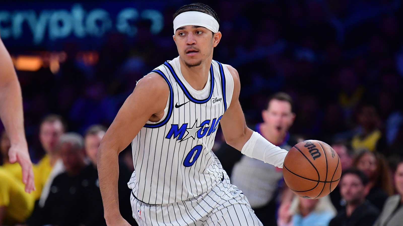 Orlando Magic guard Anthony Black (0) moves the ball up court against the Los Angeles Lakers during the first half at Crypto.com Arena.