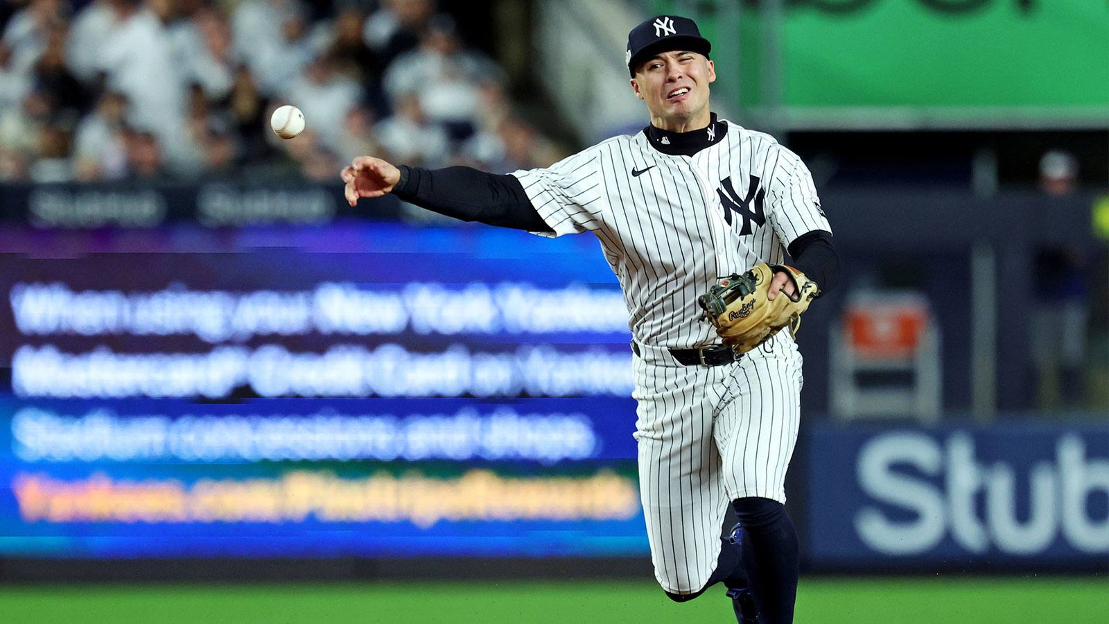 New York Yankees shortstop Anthony Volpe (11) throws to first base for an out during the third inning against the Toronto Blue Jays during game four of the ALDS round for the 2025 MLB playoffs at Yankee Stadium.