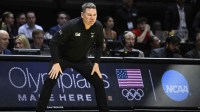 Arizona Wildcats head coach Tommy Lloyd reacts in the first half against the Utah State Aggies during a second round game of the men's 2026 NCAA Tournament at Viejas Arena.