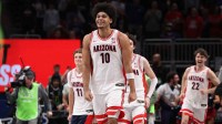 Arizona Wildcats forward Koa Peat (10) reacts after defeating the Houston Cougars during the men's Big 12 Conference Tournament Championship at T-Mobile Center.