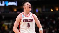 Arizona Wildcats forward Ivan Kharchenkov (8) celebrates in the second half against the Purdue Boilermakers during an Elite Eight game of the West Regional of the men's 2026 NCAA Tournament at SAP Center.