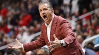 Arkansas Razorbacks head coach John Calipari reacts after a play against the Arizona Wildcats in the second half during a Sweet Sixteen game of the West Regional of the men's 2026 NCAA Tournament at SAP Center.