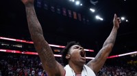 Arkansas forward Nick Pringle (23) celebrates after the SEC tournament championship win over Vanderbilt at Bridgestone Arena in Nashville, Tenn., Sunday, March 15, 2026.