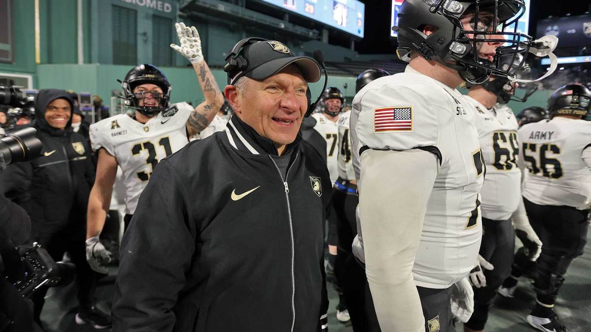 Army Black Knights head coach Jeff Monken celebrates a touchdown against the UConn Huskies during the second half of the Wasabi Fenway Bowl at Fenway Park.