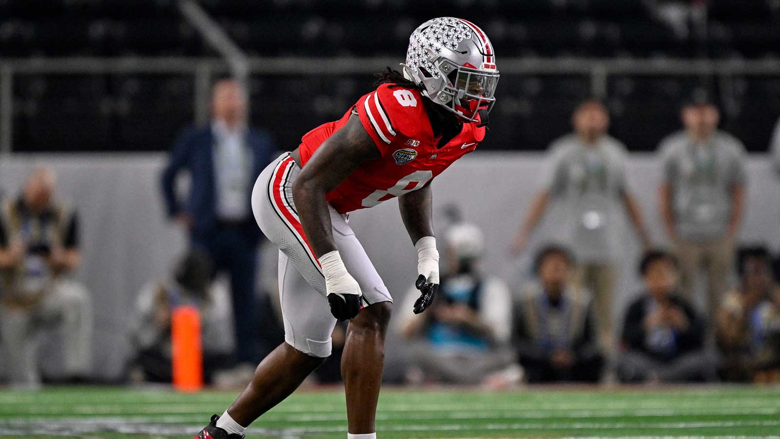 Ohio State Buckeyes linebacker Arvell Reese (8) gets into position during the 2025 Cotton Bowl and quarterfinal game of the College Football Playoff at AT&T Stadium.