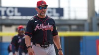 Atlanta Braves bench coach/infield coach Walt Weiss (4) looks on before a spring training game against the Toronto Blue Jays at TD Ballpark.
