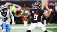 Atlanta Falcons quarterback Michael Penix Jr. (9) throws the ball in the third quarter against the Carolina Panthers at Mercedes-Benz Stadium.