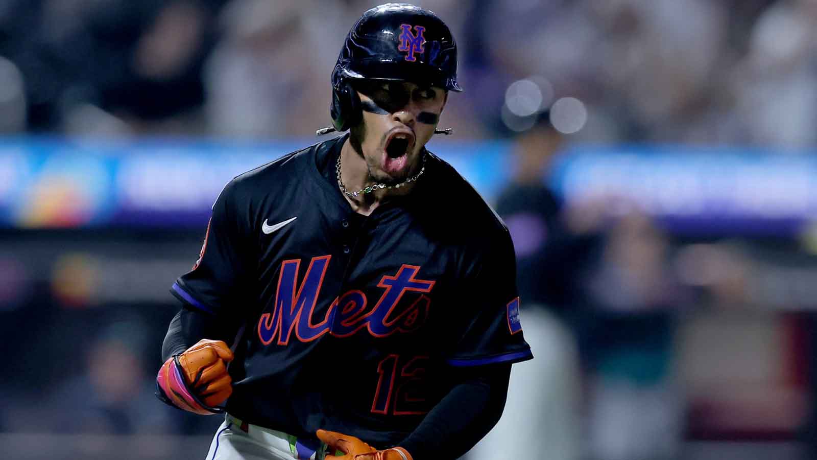 New York Mets shortstop Francisco Lindor (12) reacts as he rounds the bases after hitting a two run home run against the Seattle Mariners during the fourth inning at Citi Field. Mandatory Credit: Brad Penner-Imagn Images