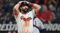Cleveland Guardians catcher Austin Hedges (27) reacts after striking out to end the fifth inning against the Texas Rangers at Progressive Field.