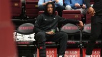 Southern Methodist University Mustangs guard B.J. Edwards (center) sits on the bench before the start of the second half against the Stanford Cardinal at Maples Pavilion.