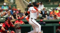 Baltimore Orioles shortstop Gunner Henderson (2) singles during the fifth inning against the Boston Red Sox at Ed Smith Stadium
