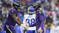 Baltimore Ravens place kicker Justin Tucker (9) celebrates his field goal with guard John Simpson (76) during the second half against the Los Angeles Rams at M&T Bank Stadium.