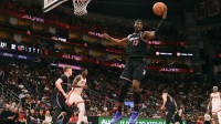 Miami Heat center Bam Adebayo (13) grabs a rebound against the Houston Rockets in the first half at Toyota Center.