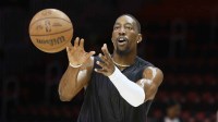 Miami Heat center Bam Adebayo (13) warms up against the Detroit Pistons at Kaseya Center.
