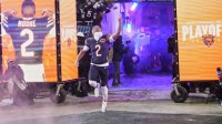 Chicago Bears wide receiver DJ Moore (2) runs onto the field during player introductions before a NFC Divisional Round game against the Los Angeles Rams at Soldier Field.