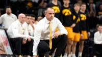Iowa head coach Ben McCollum watches his team compete against the Ohio State Buckeyes Feb. 25, 2026 at Carver-Hawkeye Arena in Iowa City, Iowa.