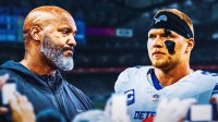 Detroit Lions general manager Brad Holmes standing next to Aidan Hutchinson at Ford Field.