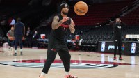 Blazers guard Damian Lillard (0) warms up prior to the against the Minnesota Timberwolves at Moda Center