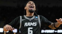 VCU Rams guard Terrence Hill Jr. (6) celebrates after defeating the North Carolina Tar Heels in overtime of a first round game of the men's 2026 NCAA Tournament at Bon Secours Wellness Arena.