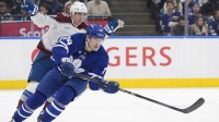 Toronto Maple Leafs forward Bobby McMann (74) passes the puck against the Colorado Avalanche during the second period at Scotiabank Arena.