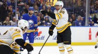 Boston Bruins right wing David Pastrnak (88) reacts after scoring a goal during the first period against the Buffalo Sabres at KeyBank Center.