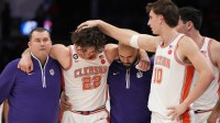 Clemson Tigers forward Jake Wahlin (10) rubs center Carter Welling