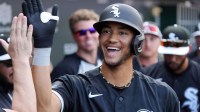Chicago White Sox outfielder Braden Montgomery (91) celebrates after hitting a solo home run against the Chicago Cubs in the first inning at Sloan Park