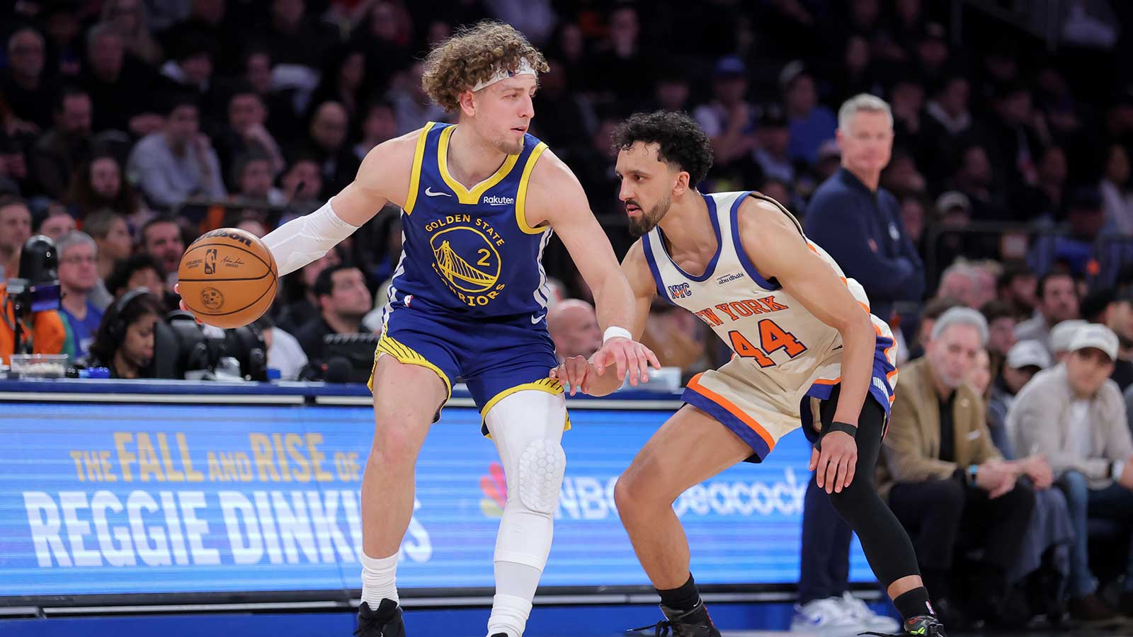 Golden State Warriors guard Brandin Podziemski (2) controls the ball against New York Knicks guard Landry Shamet (44) during the fourth quarter at Madison Square Garden.