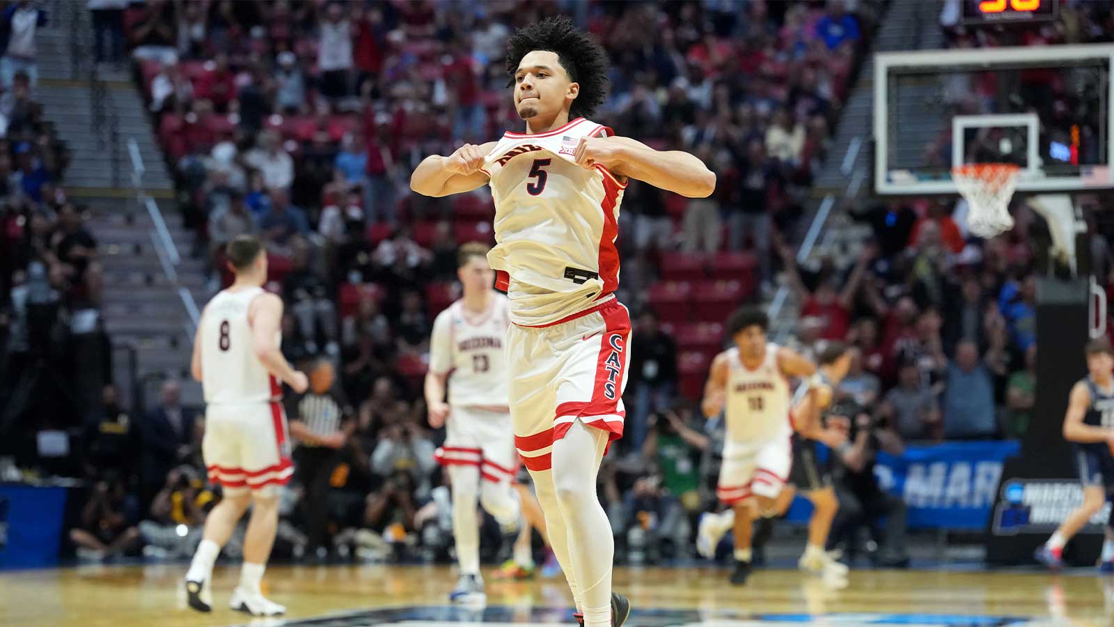 Arizona Wildcats guard Brayden Burries (5) reacts in the second half against the Utah State Aggies during a second round game of the men's 2026 NCAA Tournament at Viejas Arena.
