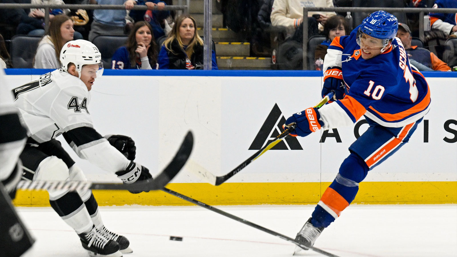 New York Islanders center Brayden Schenn (10) attempts a shot defended by Los Angeles Kings defenseman Mikey Anderson (44) during the second period at UBS Arena.