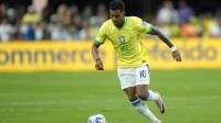 Brazil forward Rodrygo (10) moves the ball during the first half against Paraguay at Allegiant Stadium.