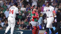 United States outfielder Aaron Judge (99) celebrates a home run in the third inning against Mexico at Daikin Park.