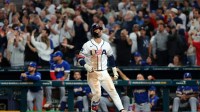 United States first baseman Bryce Harper (24) reacts after hitting a home run against Venezuela in the eighth inning during the 2026 World Baseball Classic Championship game at loanDepot Park.
