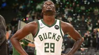 Milwaukee Bucks forward Alex Antetokounmpo (29) reacts after playing his first NBA game against the Dallas Mavericks at Fiserv Forum.