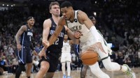 Bucks forward Giannis Antetokounmpo drives vs. Magic's Franz Wagner