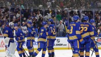 The Buffalo Sabres celebrate a win over the Vegas Golden Knights at KeyBank Center.